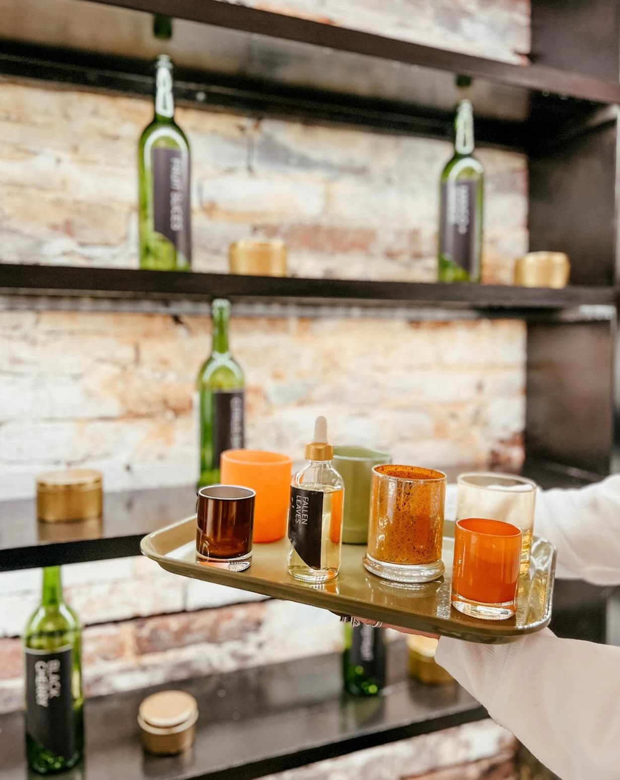 A tray of freshly poured candles in front of the Scent Cellar